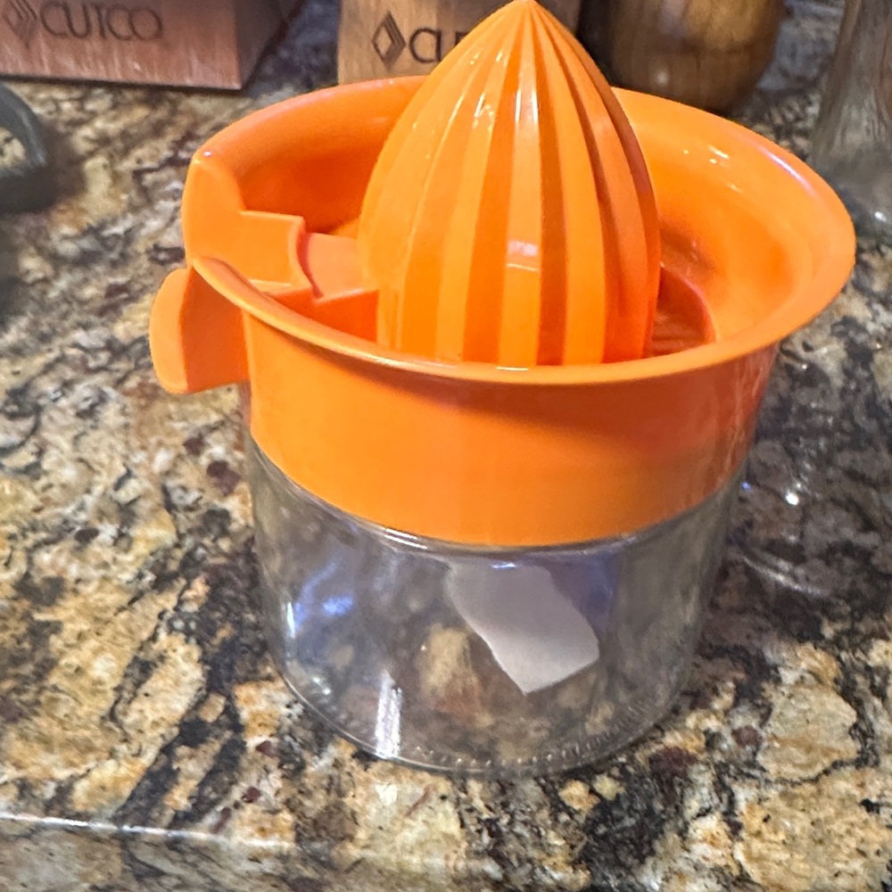 Orange Manual Citrus Juicer. NWOT - never used